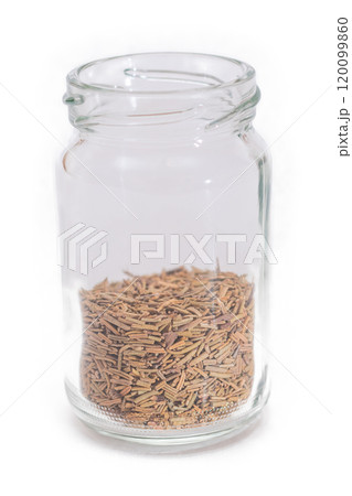 Rosemary Seasoning in a Small Glass Jar Isolated 120099860