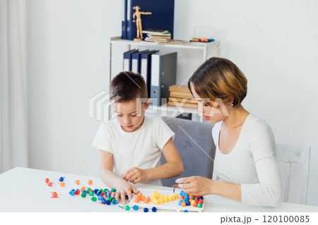 The teacher conducts educational games with a constructor The teacher conducts educational games with a constructor 120100085