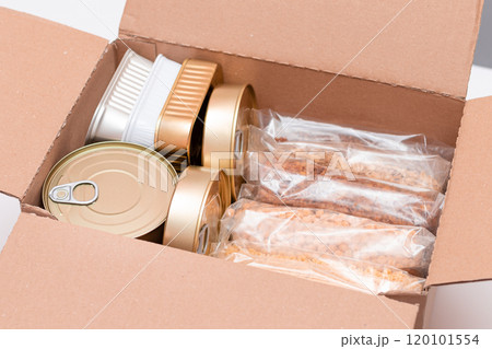 Carton Box with Canned Food, Cereals and Grocery - Donation Box or Food Reserves 120101554