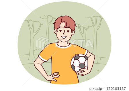 Little boy with soccer ball enjoys outdoor recreation and with smile looks at screen 120103187