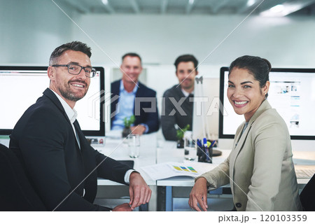 Success is the product of teamwork. Shot of corporate colleagues working together in their office. 120103359
