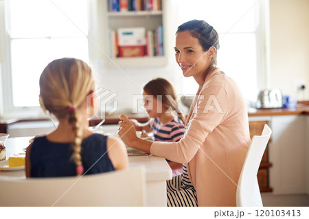 Having fun at the breakfast table. Shot of a family having breakfast together. Having fun at the breakfast table. Shot of a family having breakfast together. 120103413