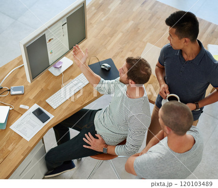 Taking care of business. High angle shot of three designers working together on a project in an office. 120103489