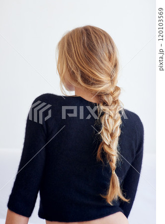 Back to the basics. Rearview shot of woman with a plaited hairstyle. 120103569