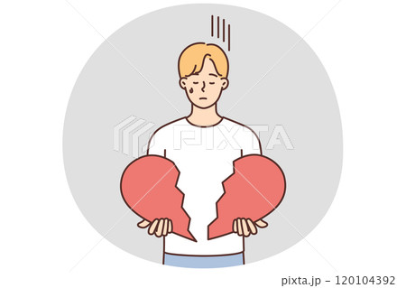 Unhappy man hold broken heart in hands 120104392