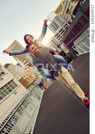 Hes not just a boyfriend, hes my best friend. Shot of a happy young couple enjoying a piggyback ride in the city. Hes not just a boyfriend, hes my best friend. Shot of a happy young couple enjoying a piggyback ride in the city. 120104517