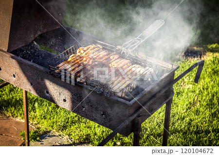 Frying meat on the grill Frying meat on the grill 120104672