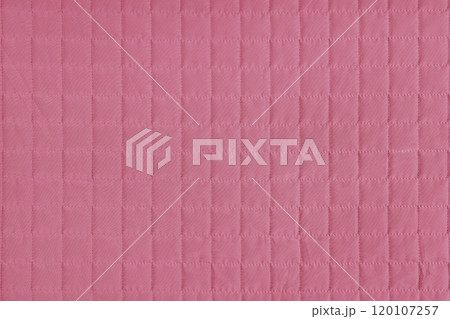 Checkered stitching pattern, pink quilted fabric background. Blanket stitch square texture 120107257