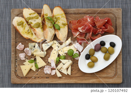 Plate for a good mood. Cold appetizers in a restaurant. A snack for a good mood. 120107492