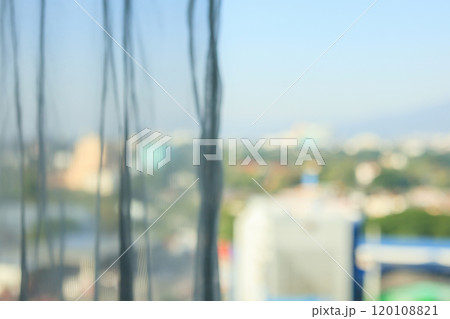 Abstract blur curtain window with city background 120108821