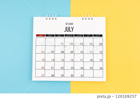 July 2025 calendar on blue and yellow color background. July 2025 calendar on blue and yellow color background. 120109257