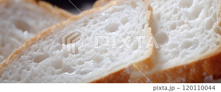 Close up of fluffy white bread slices, toasted edges, food background 120110044