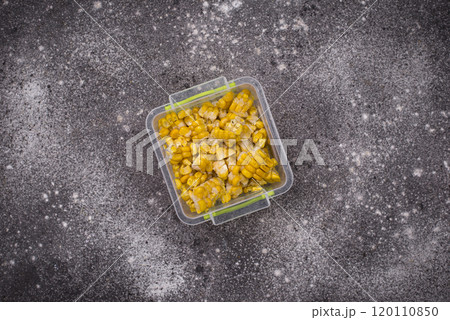 Frozen corn in plastic container Frozen corn in plastic container 120110850