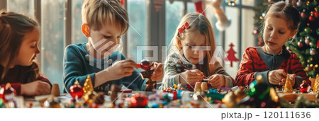 A joyful group of children making DIY Christmas ornaments, surrounded by craft materials in a cheerful atmosphere, banner 120111636