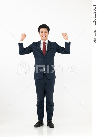 ガッツポーズをするビジネスマン ガッツポーズをするビジネスマン 120112011