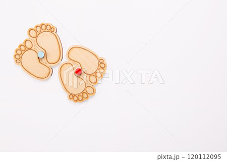 Wooden baby feets on white background. World Prematurity day concept. Gender reveal  120112095