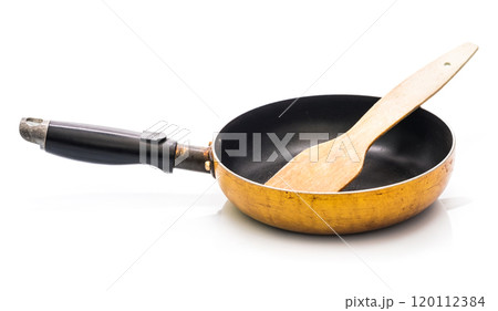 Frying pan with spatula isolated on white background Frying pan with spatula isolated on white background 120112384