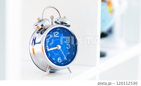 Analog alarm clock with blue face Analog alarm clock with blue face 120112530