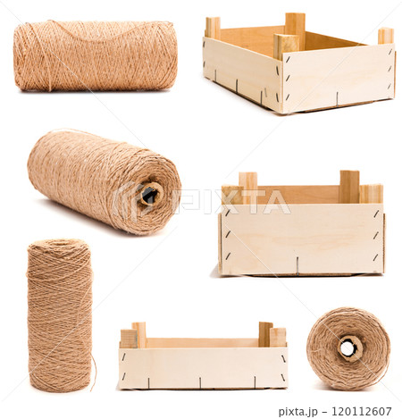wooden empty box and roll of twine 120112607