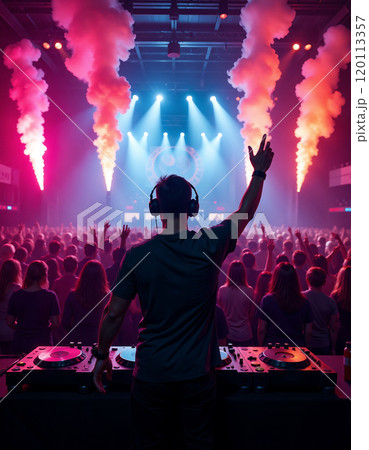 Dj energizing a vibrant nightclub crowd with dynamic light show and music 120113357
