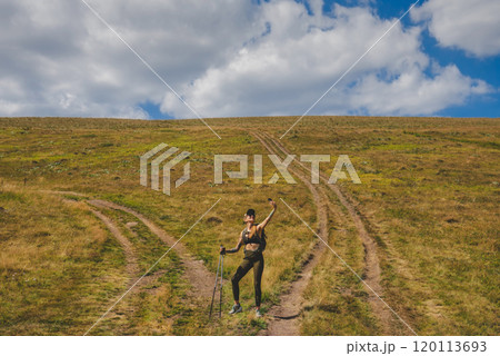 Woman Tourist Taking Selfie in Beautiful Landscape Woman Tourist Taking Selfie in Beautiful Landscape 120113693