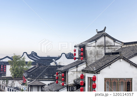 SHAOXING CHINA-Oct16, 2019: Shaoxing Rice Wine Town, a typical water town in southern China, is a symbol of traditional Chinese culture with ancient gates, streets, alleys and Bridges. SHAOXING CHINA-Oct16, 2019: Shaoxing Rice Wine Town, a typical water town in southern China, is a symbol of traditional Chinese culture with ancient gates, streets, alleys and Bridges. 120114357
