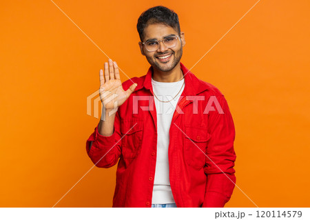 Happy man smiling friendly waving hands gesturing hello greeting or goodbye, meeting invitation Happy man smiling friendly waving hands gesturing hello greeting or goodbye, meeting invitation 120114579