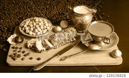 Sweets on the background of coffee on the table Sweets on the background of coffee on the table 120116828