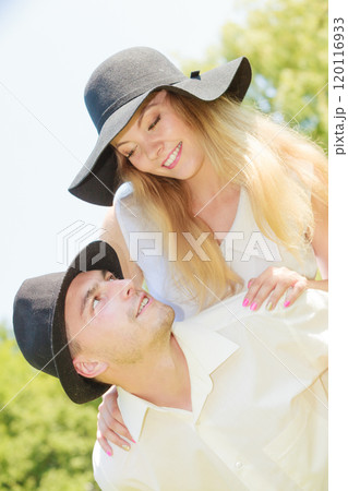 Happy couple having romantic date in park Happy couple having romantic date in park 120116933