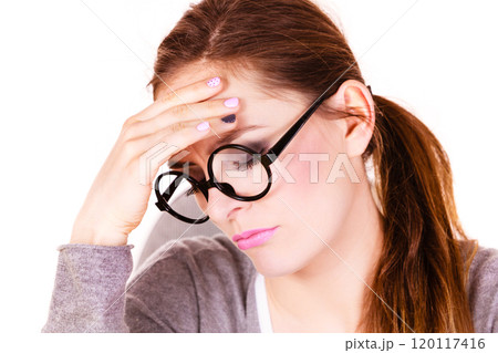 Woman suffering from headache migraine pain 120117416