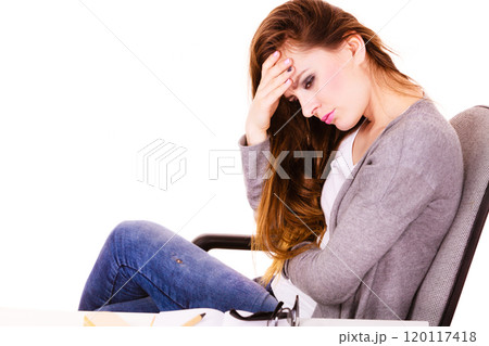 Woman suffering from headache migraine pain 120117418