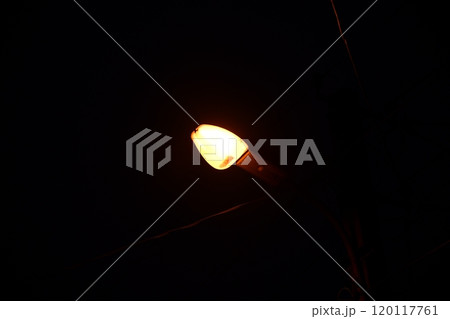 Vintage vintage lantern. The street lamp glows at night. Decoration of streets Vintage vintage lantern. The street lamp glows at night. Decoration of streets 120117761