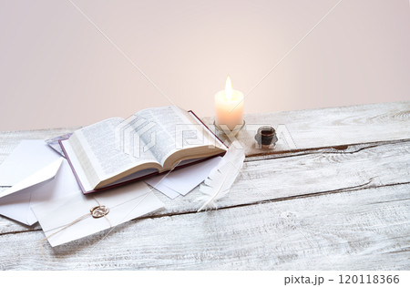 Bible on white wooden table 120118366