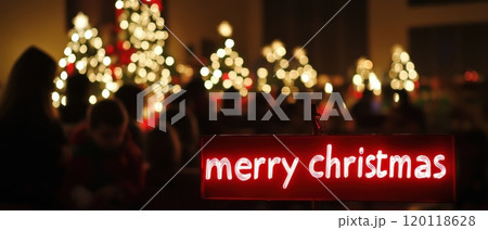 Glowing Christmas trees brighten celebrations 120118628