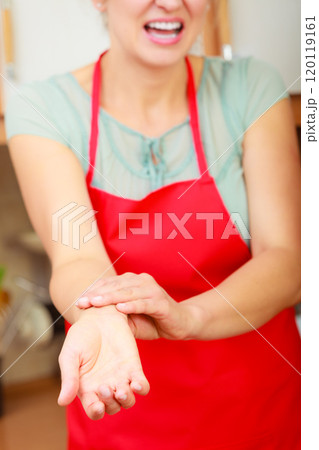 Woman checking pulse on wrist. Woman checking pulse on wrist. 120119161