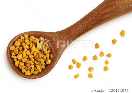 Bee pollen grains in wooden spoon isolated on white background. Top view. Flat lay Bee pollen grains in wooden spoon isolated on white background. Top view. Flat lay 120121073