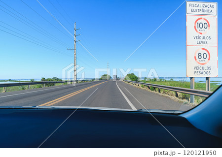 Driving on the Helio Serejo bridge, over the Parana river 120121950