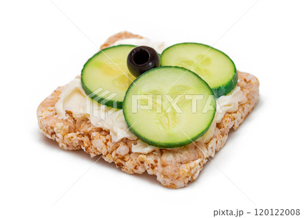 Rice Cake Sandwich with Fresh Cucumber, Cream Cheese and Olives - Isolated 120122008