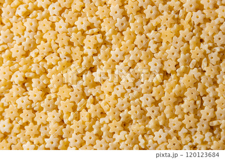 Uncooked Stelline Pasta Background 120123684