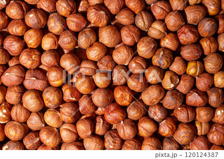 Scattered Peeled Hazelnut. Background from Hazelnuts Scattered Peeled Hazelnut. Background from Hazelnuts 120124387