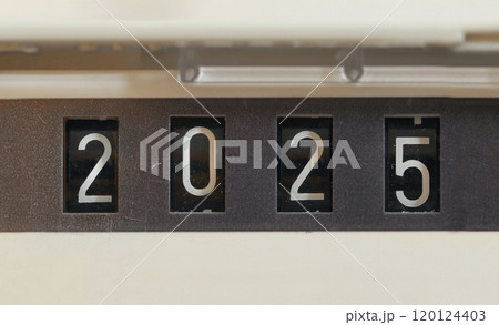 Year 2025 on a mechanical counter of gas meter 120124403