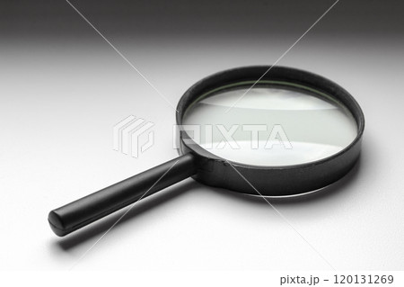 Magnifier on the windowsill 120131269