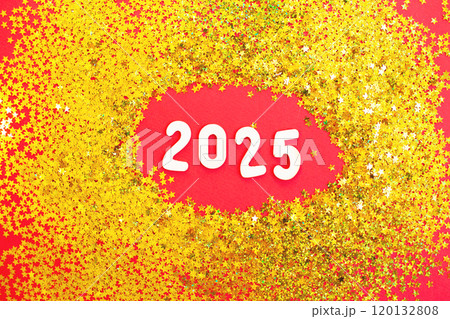 wooden number 2025 on christmas shiny red background with golden confetti wooden number 2025 on christmas shiny red background with golden confetti 120132808
