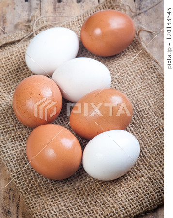 eggs on a wooden surface eggs on a wooden surface 120133545