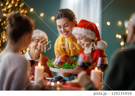 family celebrating Christmas 120135459