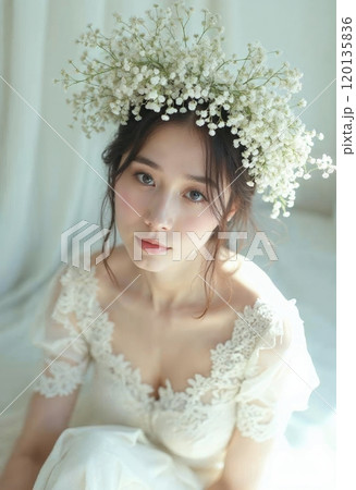 Woman in a crown of flowers. 120135836