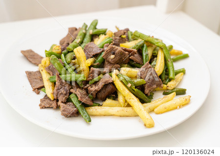 Stir Frying Beef with Green String Beans Isolated, Fried French Beans with Meat, Asian Food on White Background Stir Frying Beef with Green String Beans Isolated, Fried French Beans with Meat, Asian Food on White Background 120136024