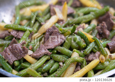 Stir Frying Beef with Green Yellow String Beans Closeup, Fried French Beans Mix with Meat, Asian Food Stir Frying Beef with Green Yellow String Beans Closeup, Fried French Beans Mix with Meat, Asian Food 120136026