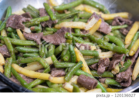 Stir Frying Beef with Green Yellow String Beans Closeup, Fried French Beans Mix with Meat, Asian Food Stir Frying Beef with Green Yellow String Beans Closeup, Fried French Beans Mix with Meat, Asian Food 120136027
