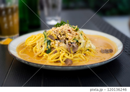 Chiang mai curry noodles, asian spicy egg pasta with meat, curried noodle soup Khao Soi or Khao Sawy, thai?food Chiang mai curry noodles, asian spicy egg pasta with meat, curried noodle soup Khao Soi or Khao Sawy, thai?food 120136246